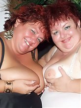 Louise and Mindy are chunky older gals showing off their breasts and sharing a cock